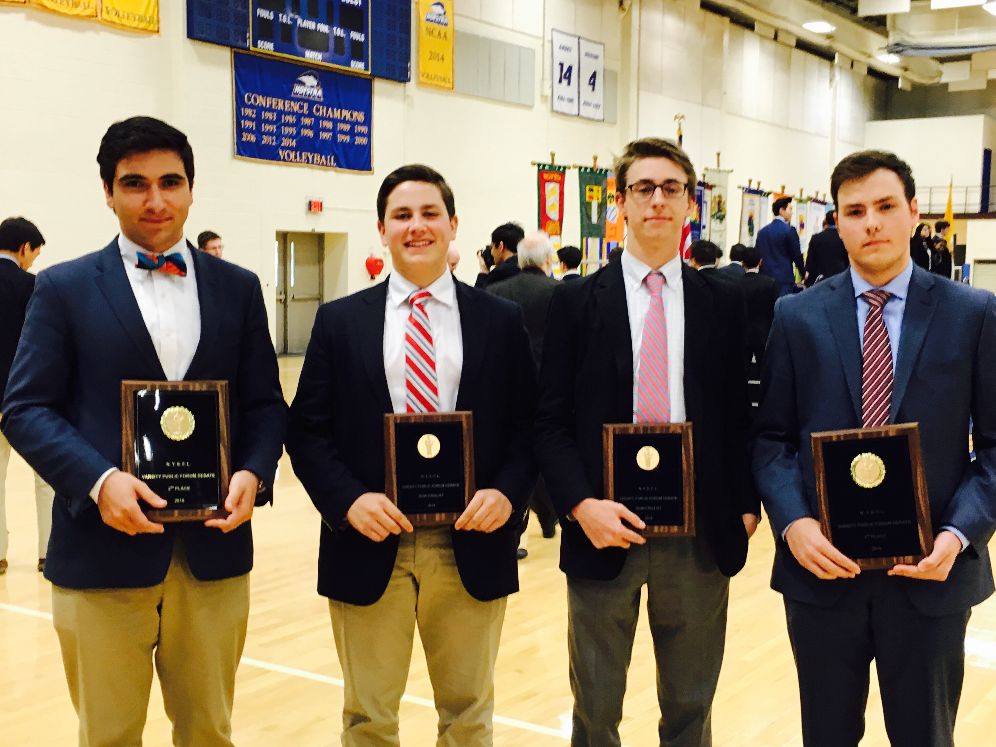 After four years of hard work, seniors Peter Charalambous, Anthony Sikorski, Rob Wines, and Brendan Owens receive awards placing them among the best debaters in New York state.  